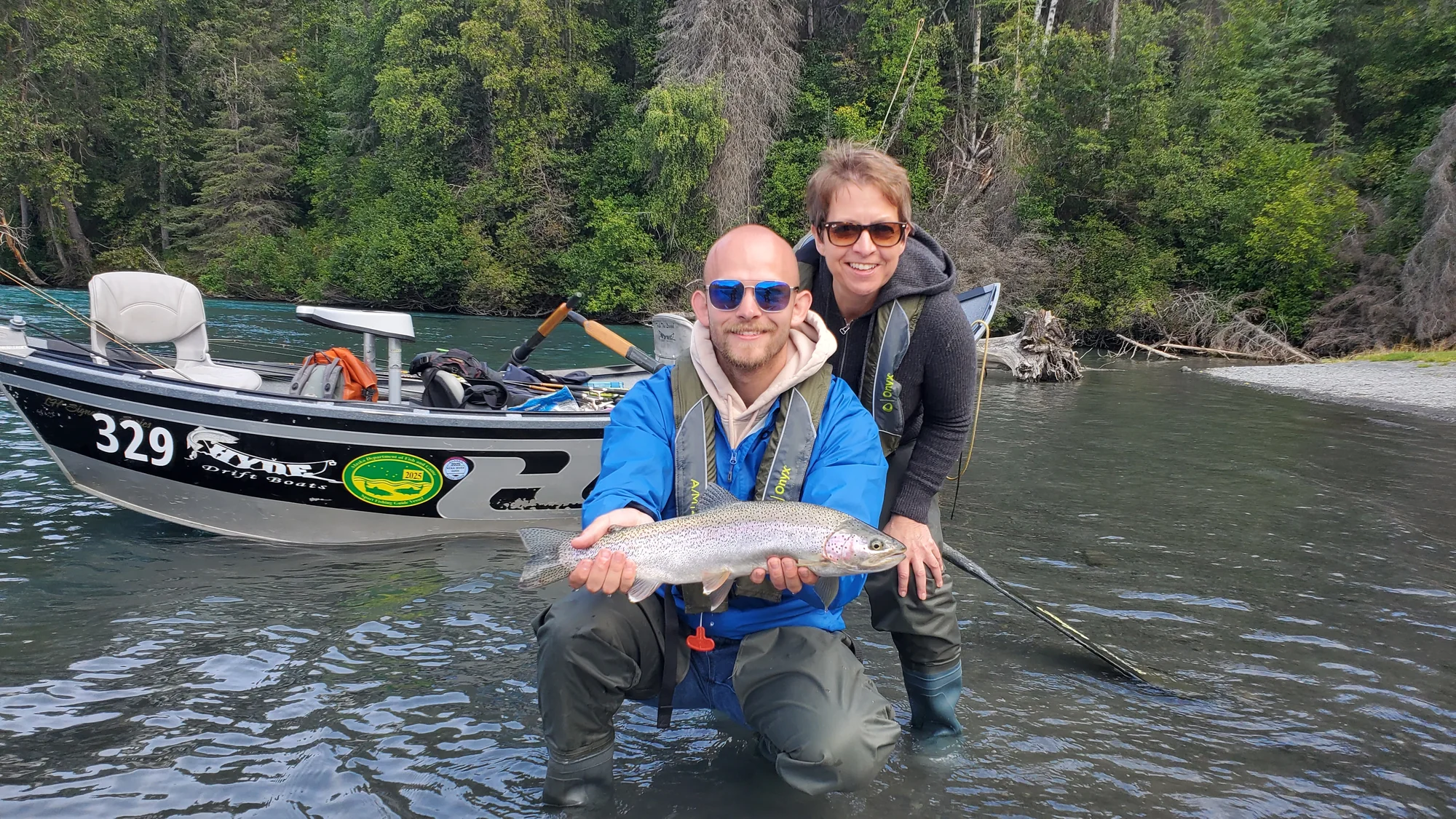 Angler with a catch on the Kenai